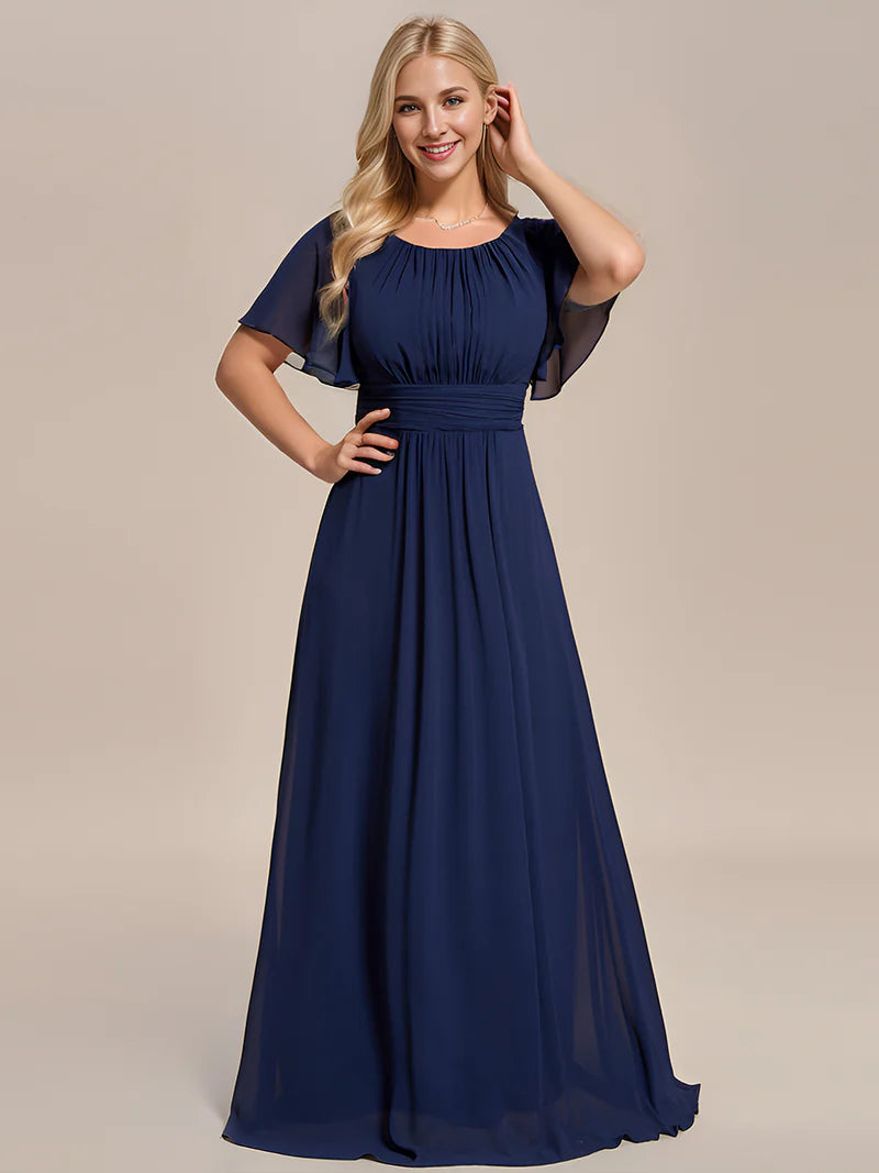 Round neck navy blue bridesmaid gown in a pleated design for elegant wedding looks