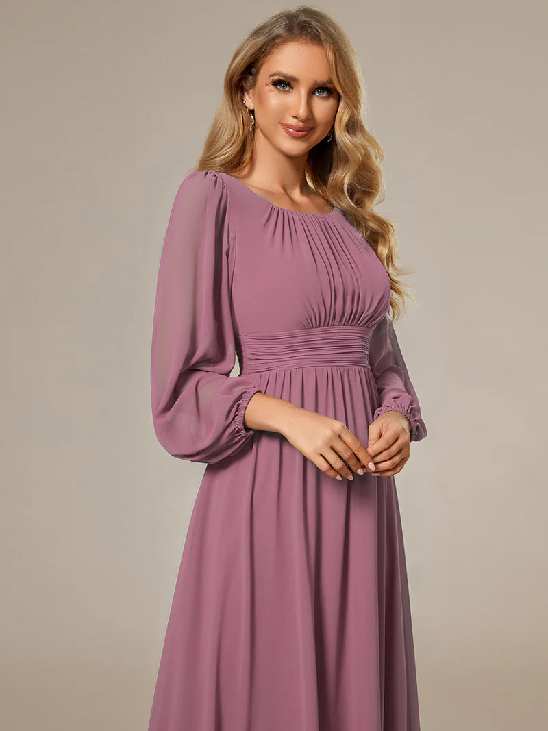 Orchid bridesmaid dress with round neckline and long lantern sleeves