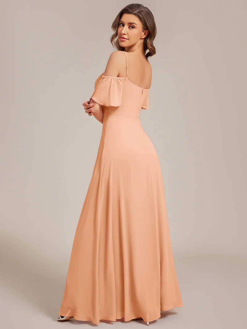 Peach chiffon bridesmaid dress with high side slit and delicate spaghetti straps
