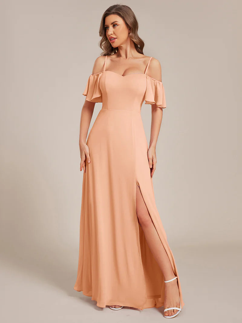 Peach chiffon bridesmaid dress with high side slit and delicate spaghetti straps