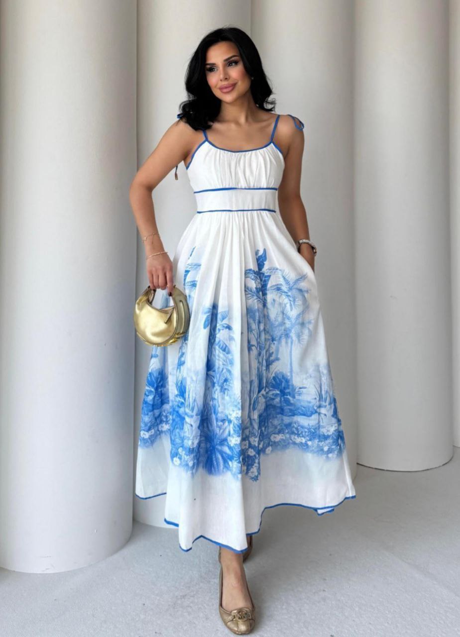 Blue cotton midi dress with palm leaf print, perfect for summer picnics