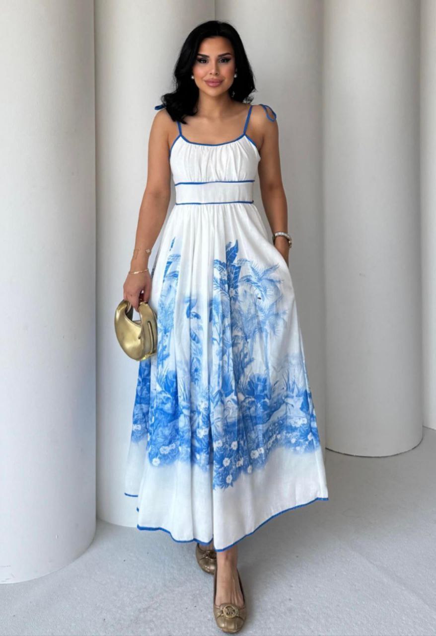 Blue cotton midi dress with palm leaf print, perfect for summer picnics