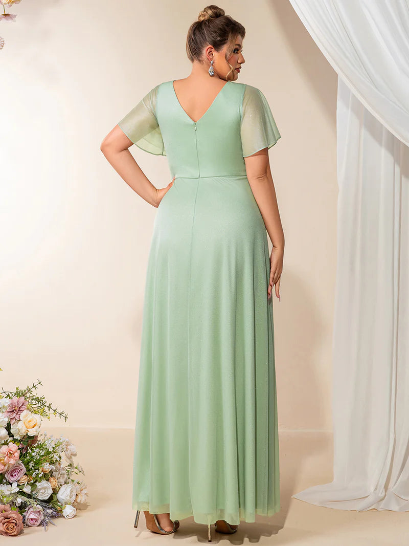 Plus size mint green evening dress with ruffle V-neckline, A-line silhouette, and short sleeves