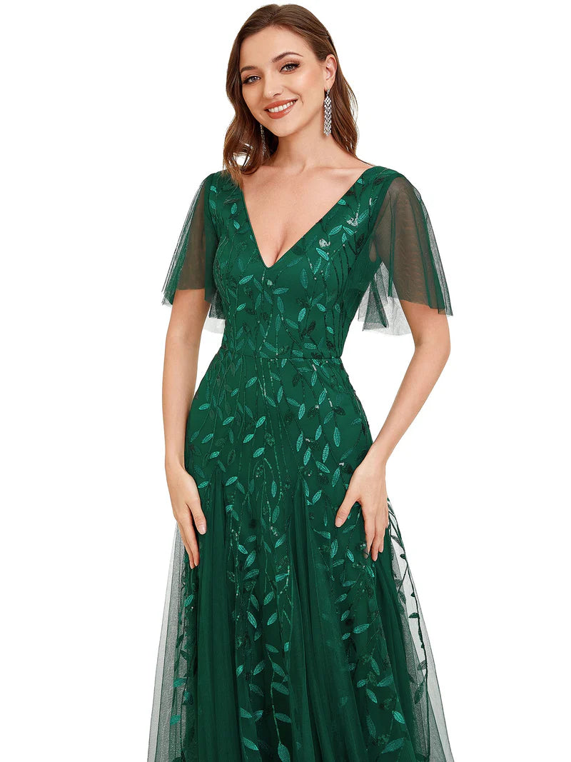 Romantic shimmery evening gown with V-neckline, ruffle sleeves, and floor-length maxi silhouette dark green dress