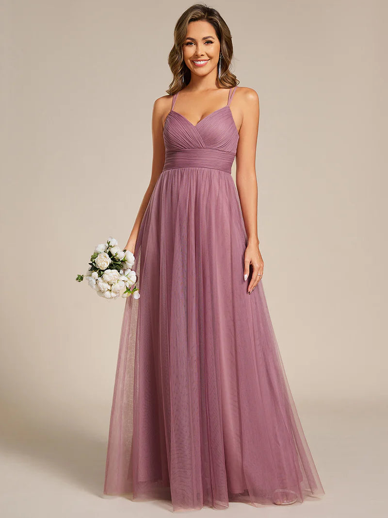 Romantic purple orchid bridesmaid dress with spaghetti straps, lace halter neckline, and open back