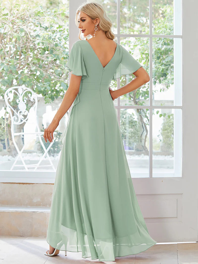 Elegant mint green chiffon high-low gown for bridesmaids featuring V-neck and soft ruffles