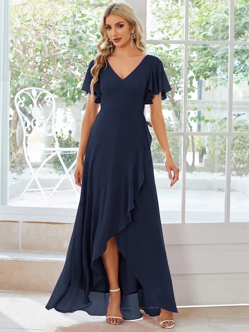 Elegant navy blue chiffon high-low gown for bridesmaids featuring V-neck and soft ruffles