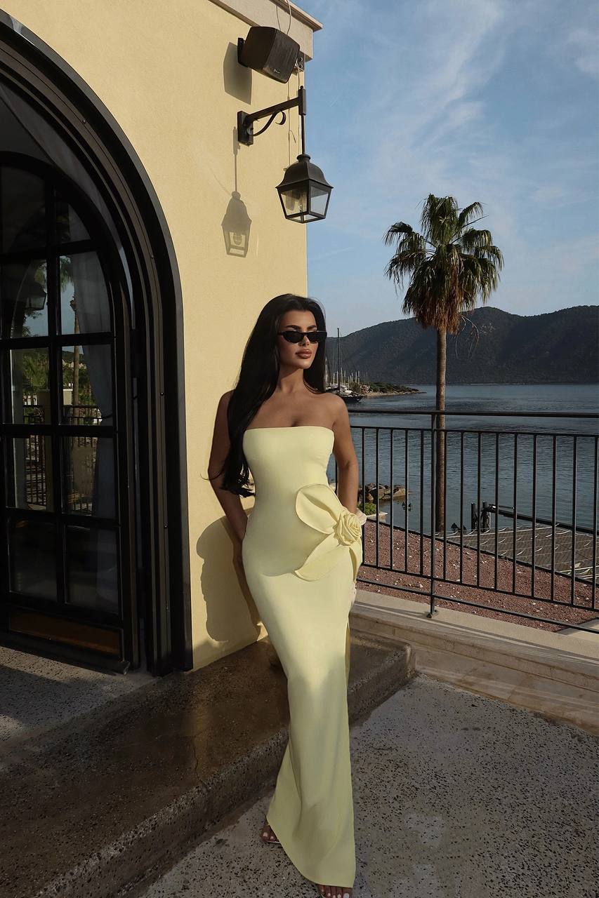 Strapless yellow maxi dress with 3D floral detailing and elegant side slit