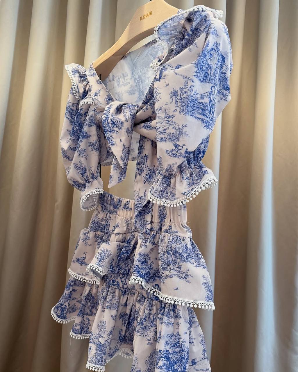 Blue toile print two-piece set with ruffle sleeves and matching bottom
