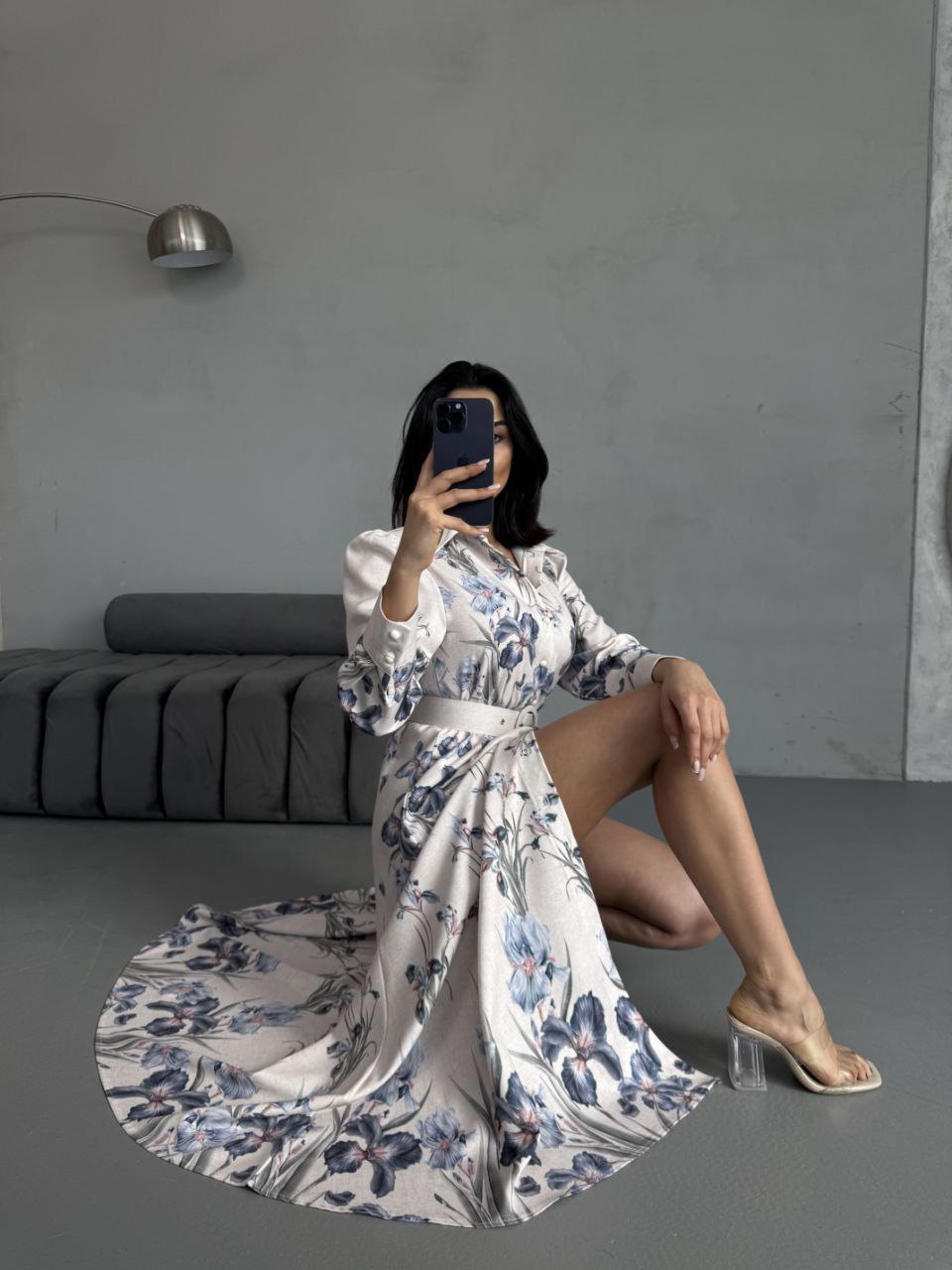 Vintage-inspired floral maxi dress with long sleeves and belted waist