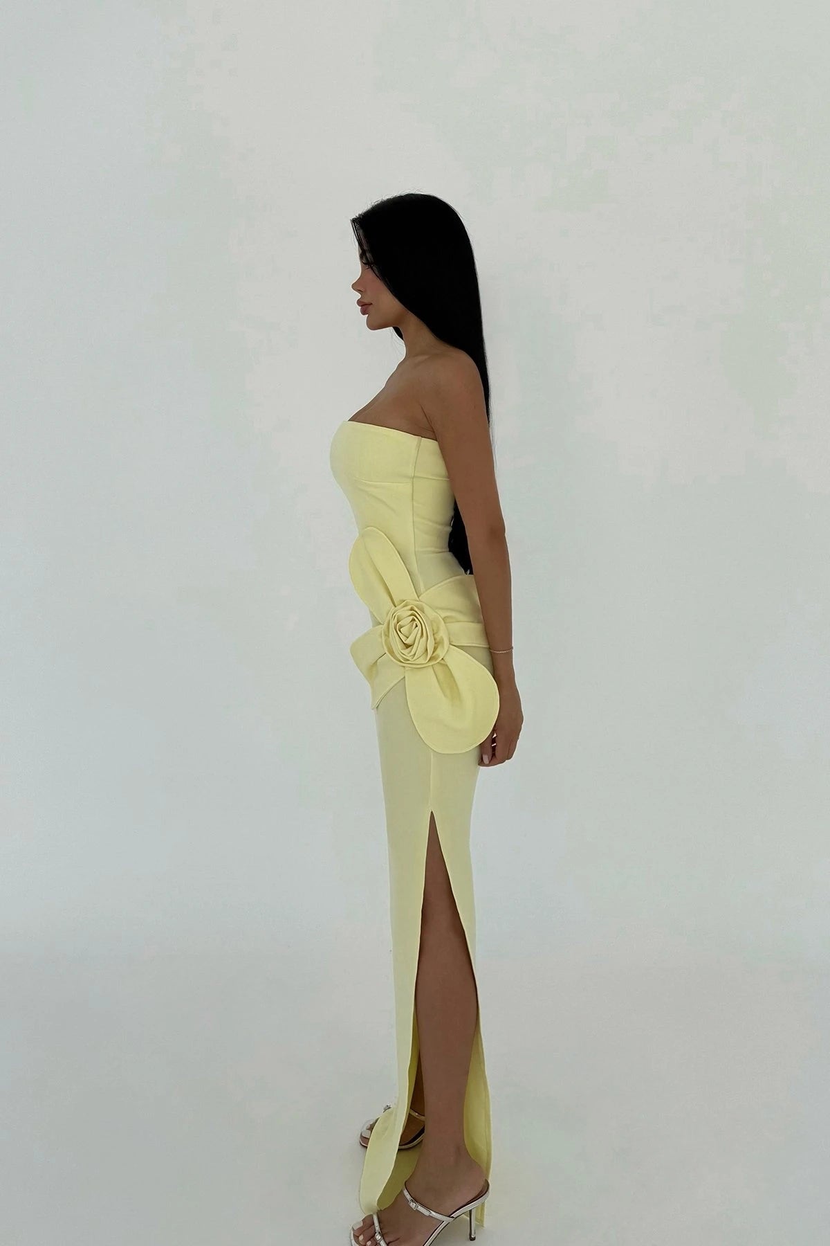 Strapless yellow maxi dress with 3D floral detailing and elegant side slit