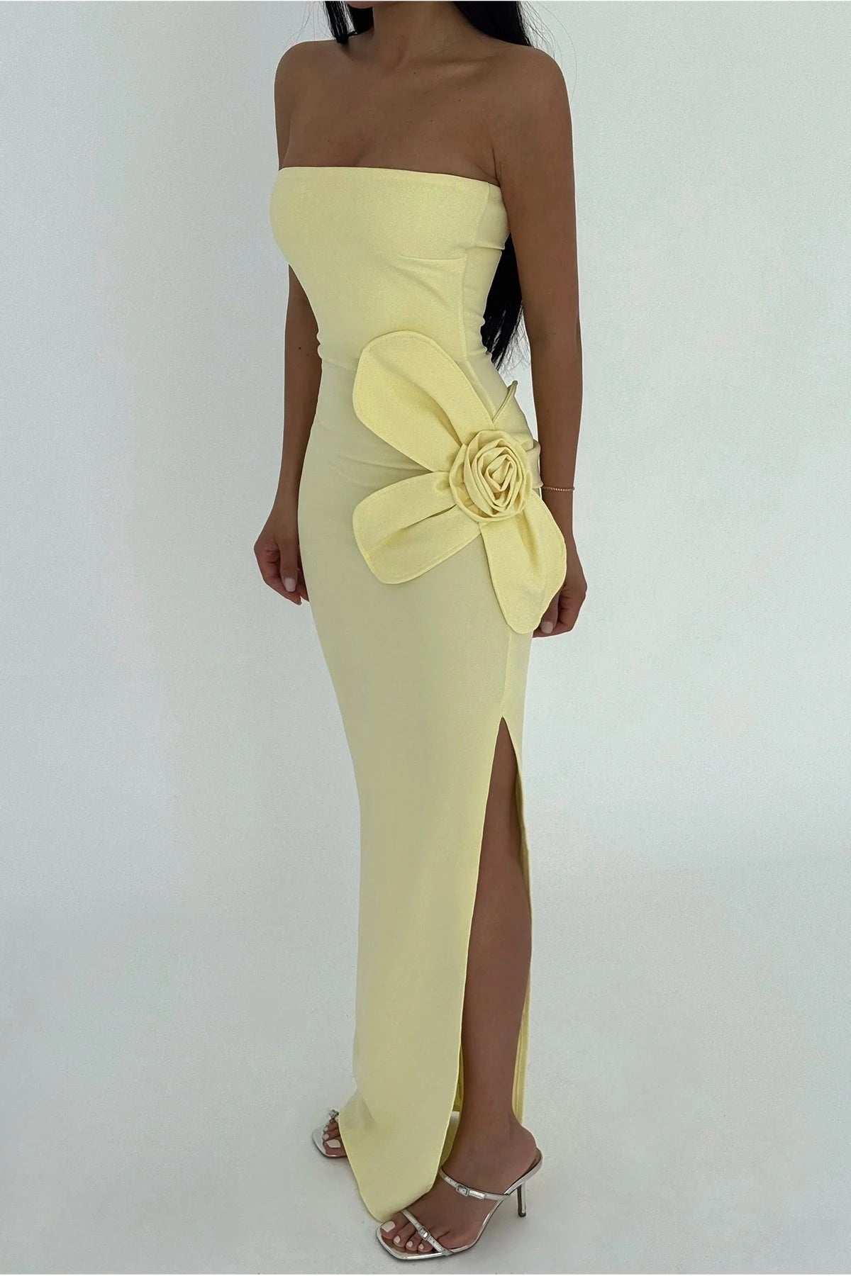 Strapless yellow maxi dress with 3D floral detailing and elegant side slit