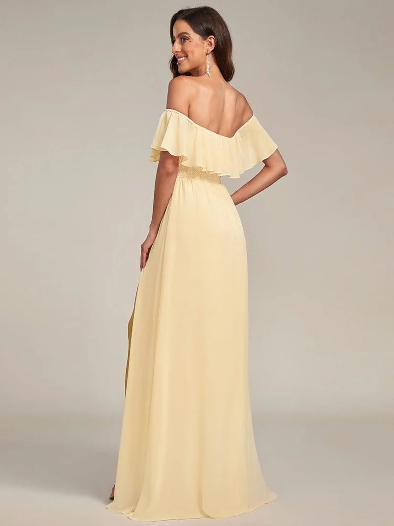 Yellow bridesmaid dress with ruffle detailing and thigh-high split