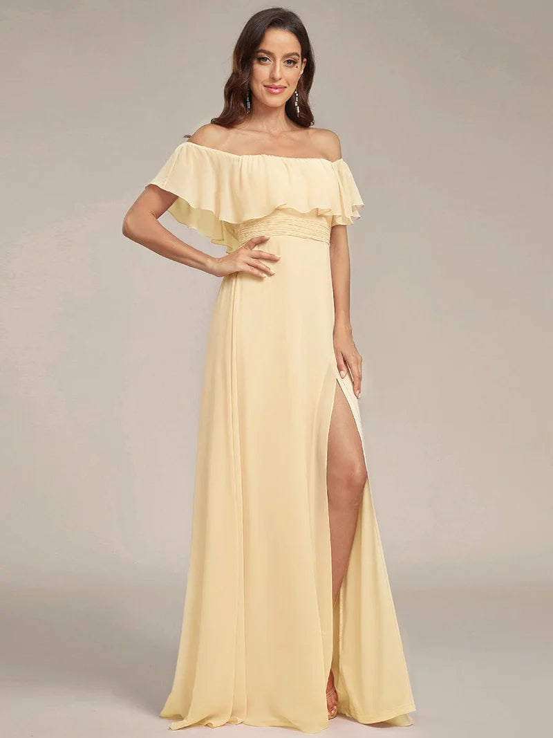 Yellow bridesmaid dress with ruffle detailing and thigh-high split