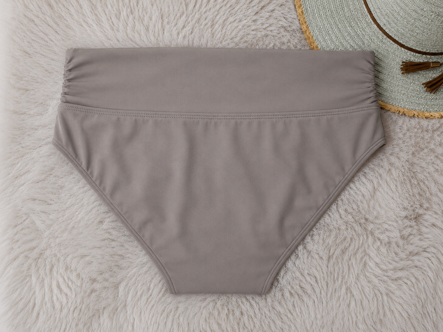 Gray underwear on a textured surface