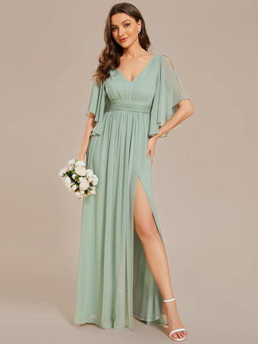 Chic and classy bridesmaid dress in mint green with pleats and round neck