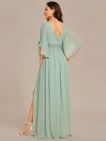 Chic and classy bridesmaid dress in mint green with pleats and round neck