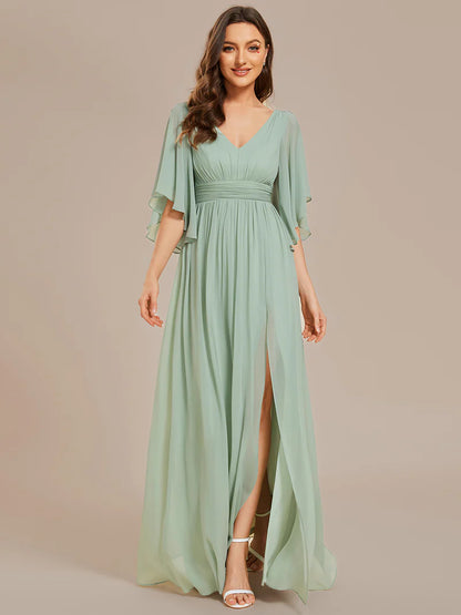 Chic and classy bridesmaid dress in mint green with pleats and round neck