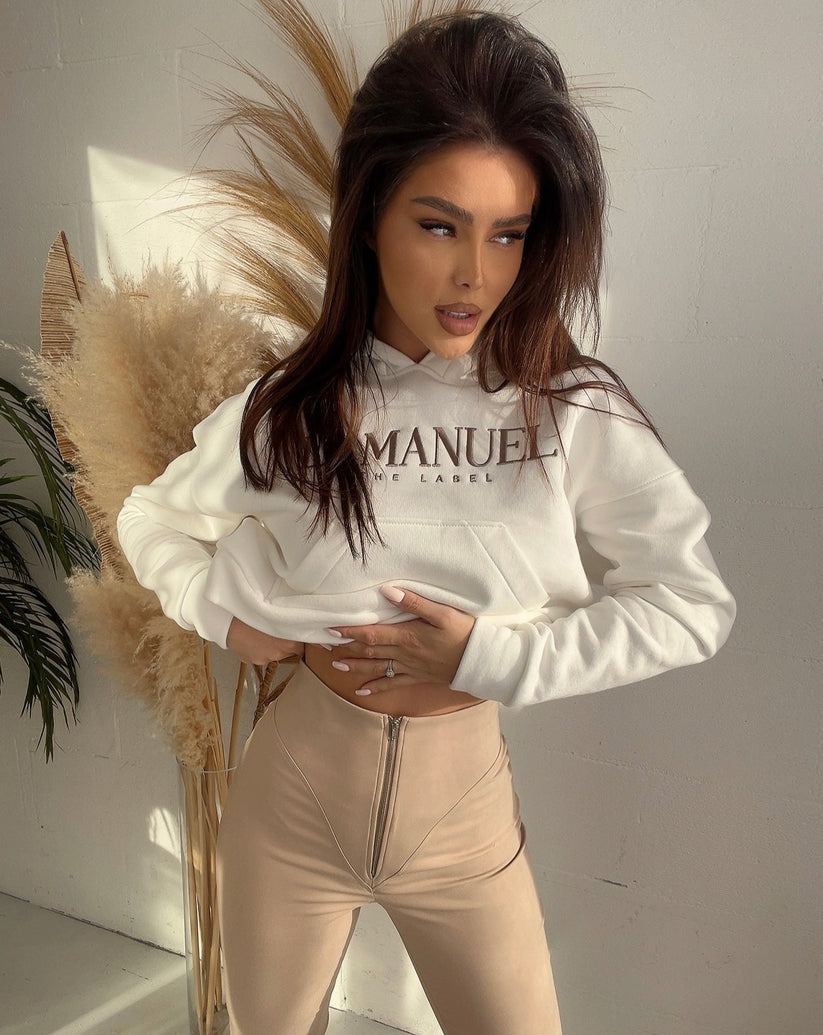 Beige slim-fit pants with front zipper, stylish everyday trousers for women