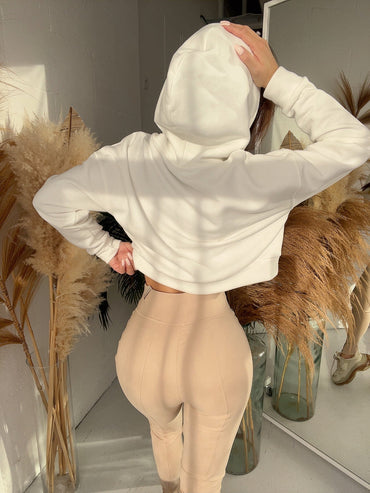 Beige slim-fit pants with front zipper, stylish everyday trousers for women