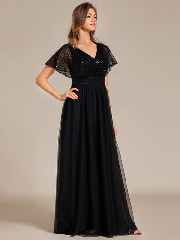 Black elegant V-neck tulle dress with ruffle sleeves, empire waist, and sparkling paillettes