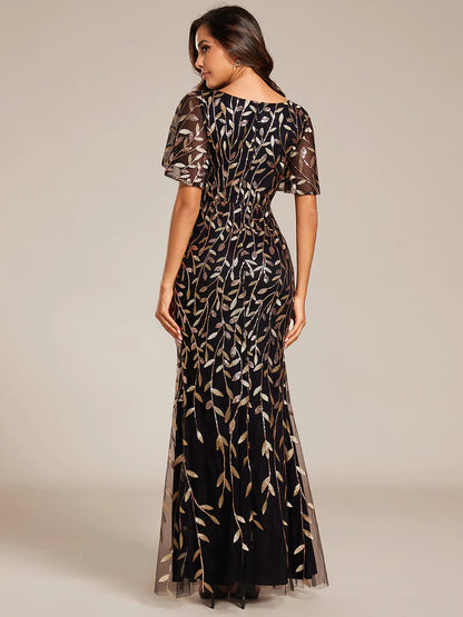 Black gold V-neck fishtail party dress with elegant leaf-shaped sequin embellishments