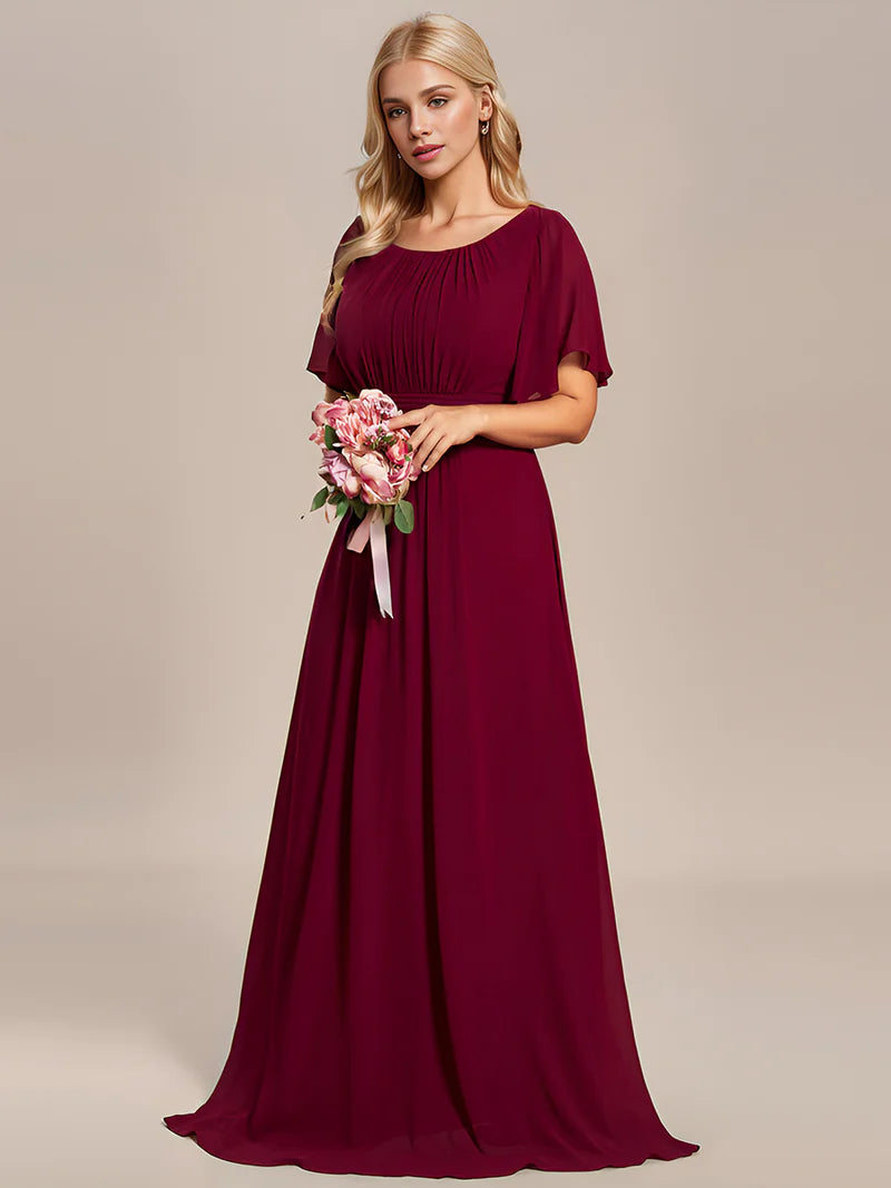 Round neck burgundy bridesmaid gown in a pleated design for elegant wedding looks