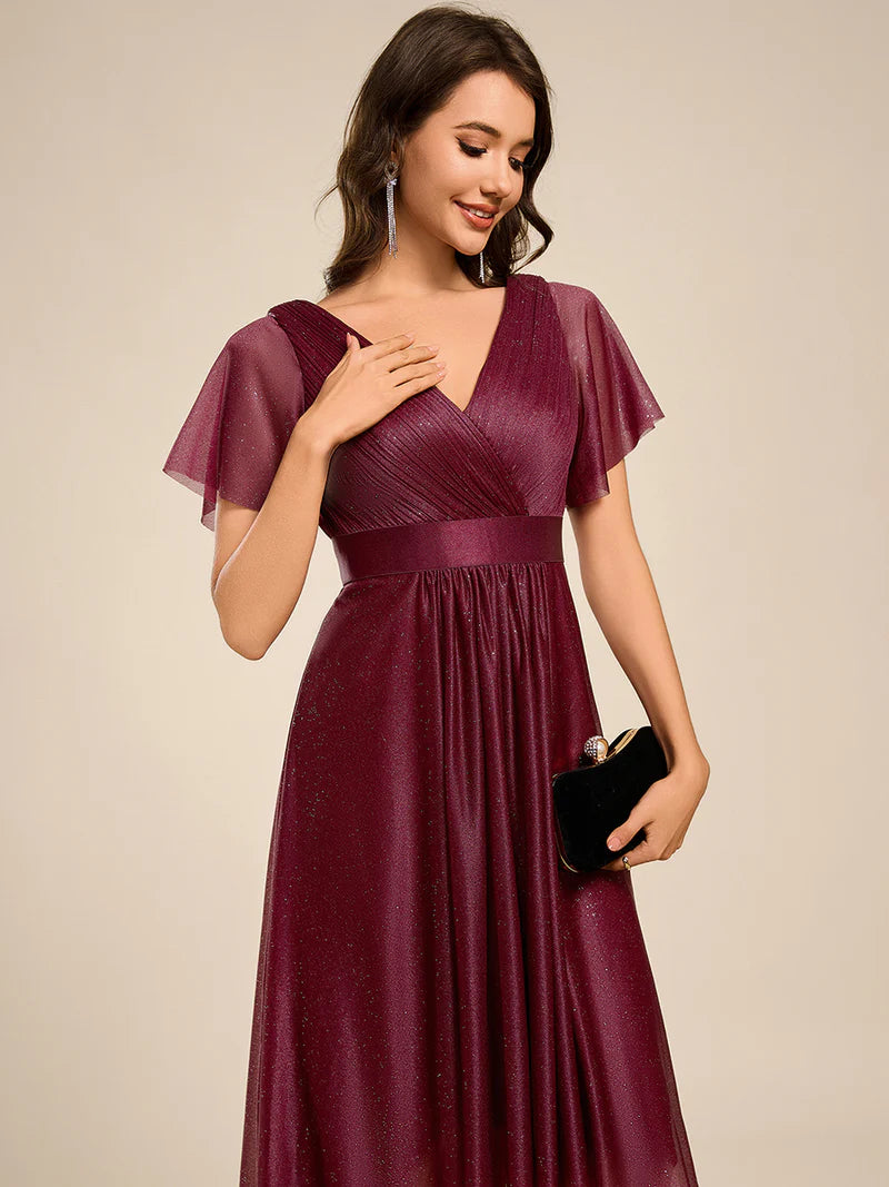 Elegant burgundy wedding guest dress with feminine ruffle sleeves