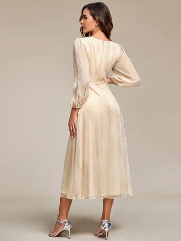 Charcoal elegant shiny chiffon wedding guest dress with long sleeves and flowing silhouette