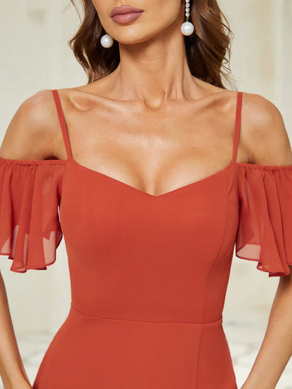 burnt orange off-shoulder dress worn by a model with a neutral background