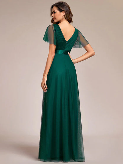 Dark green elegant A-line bridesmaid dress with V-neckline and floor-length silhouette