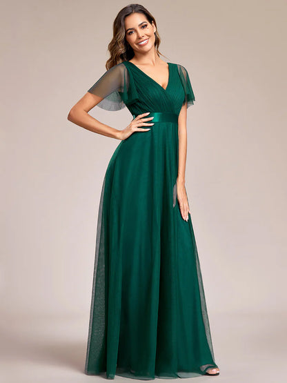 Dark green elegant A-line bridesmaid dress with V-neckline and floor-length silhouette