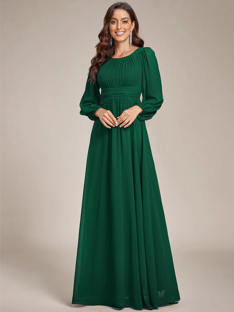 Dark green bridesmaid dress with round neckline and long lantern sleeves