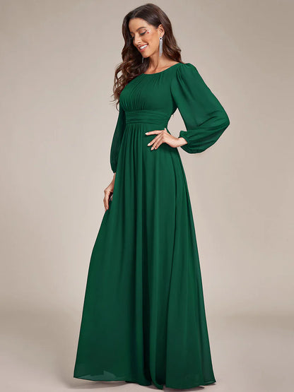 Dark green bridesmaid dress with round neckline and long lantern sleeves
