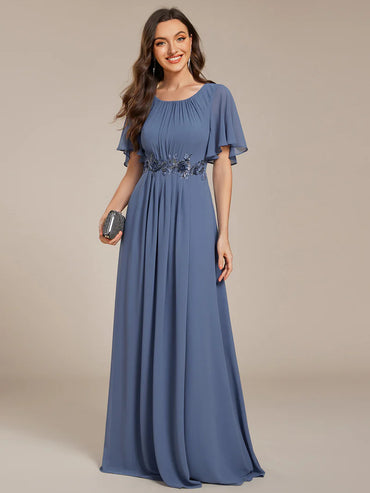 dusty a-line floor-length evening dress with short sleeves, pleated skirt, and applique embellishments