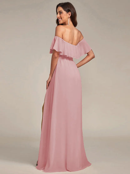 Dusty rose bridesmaid dress with ruffle detailing and thigh-high split