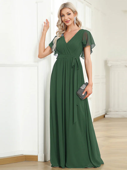 Elegant A-line bridesmaid eucalyptus dress with deep V-neckline and fluttery ruffle sleeves