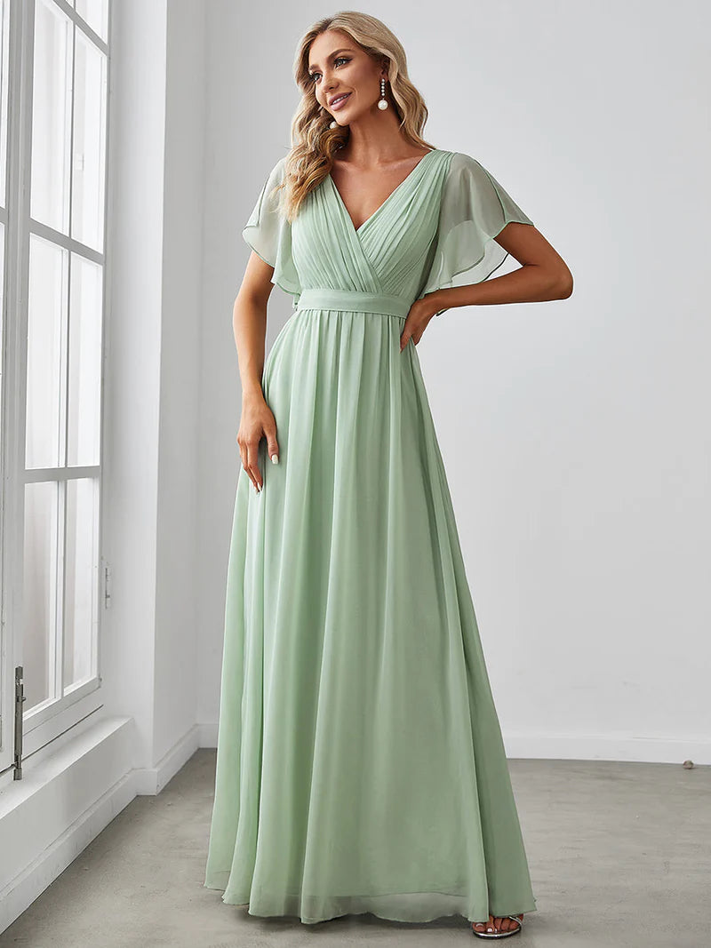 Elegant A-line bridesmaid mint green dress with deep V-neckline and fluttery ruffle sleeves