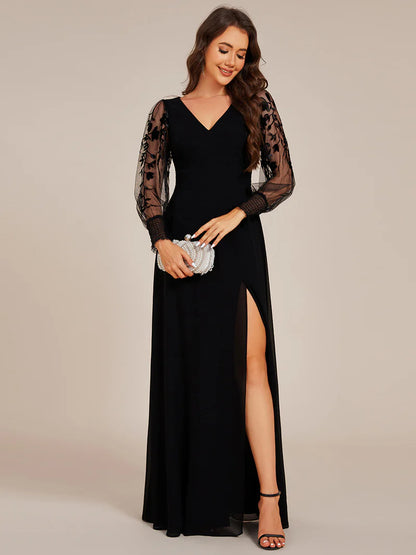 Elegant black chiffon evening dress with embroidery, sheer long sleeves, and side slit hem