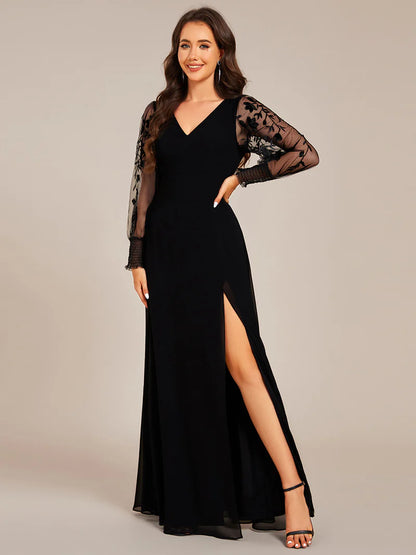 Elegant black chiffon evening dress with embroidery, sheer long sleeves, and side slit hem
