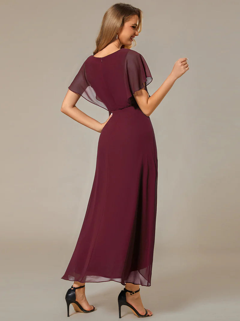 Elegant high-low chiffon evening burgundy dress with floral appliqué and short sleeves