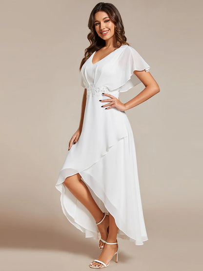 Elegant high-low chiffon evening white dress with floral appliqué and short sleeves