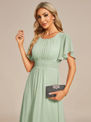 Elegant knee-length A-line wedding guest mint green dress with lotus leaf pleated design