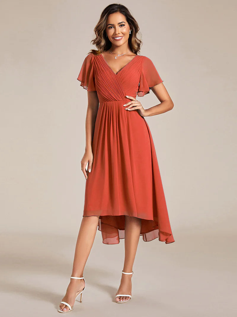 Elegant chiffon wedding guest dress with pleated skirt and ruffle accents