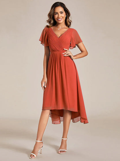 Elegant chiffon wedding guest dress with pleated skirt and ruffle accents