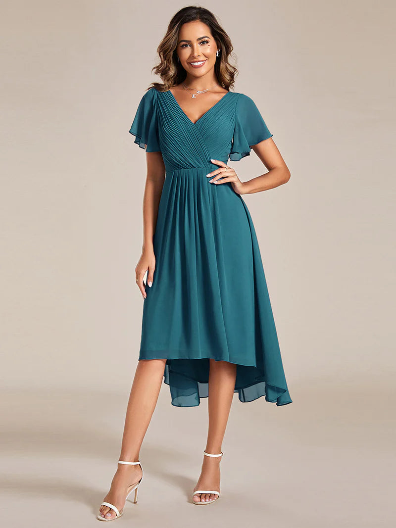 Elegant chiffon wedding guest teal dress with pleated skirt and ruffle accents
