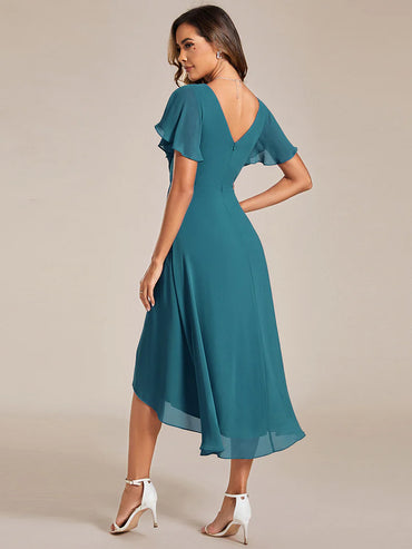 Elegant chiffon wedding guest teal dress with pleated skirt and ruffle accents