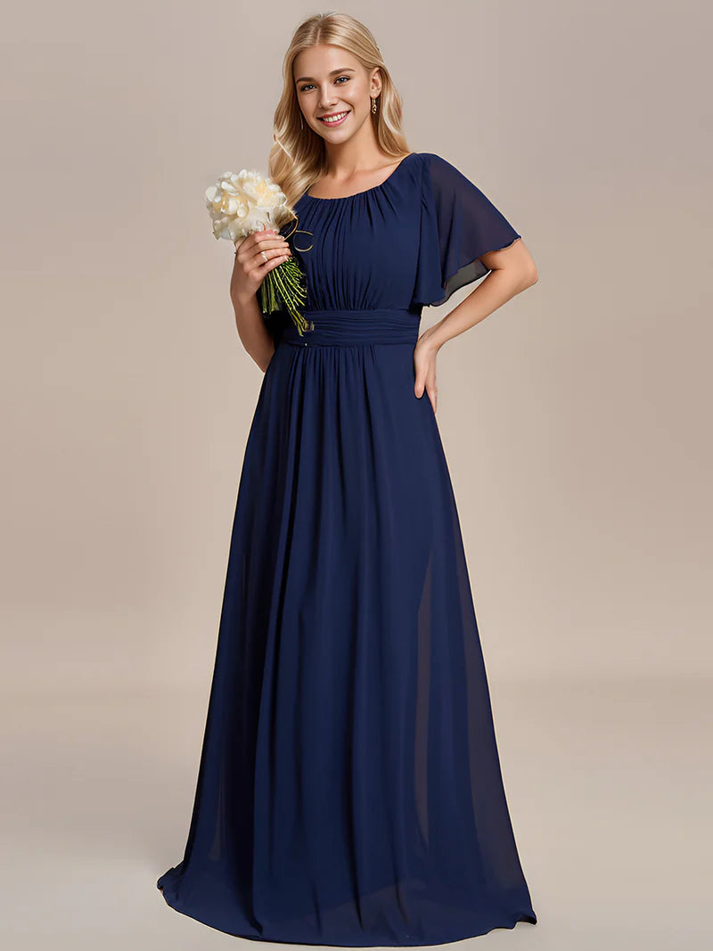 Navy blue elegant round neck bridesmaid dress with pleated skirt and flowy silhouett
