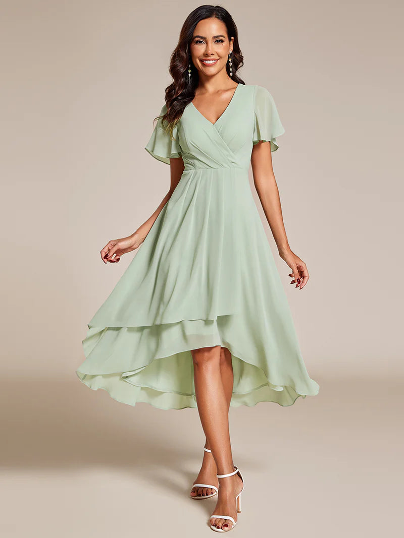 Elegant midi chiffon mint green dress with V-neck and ruffle sleeves, perfect for wedding guests