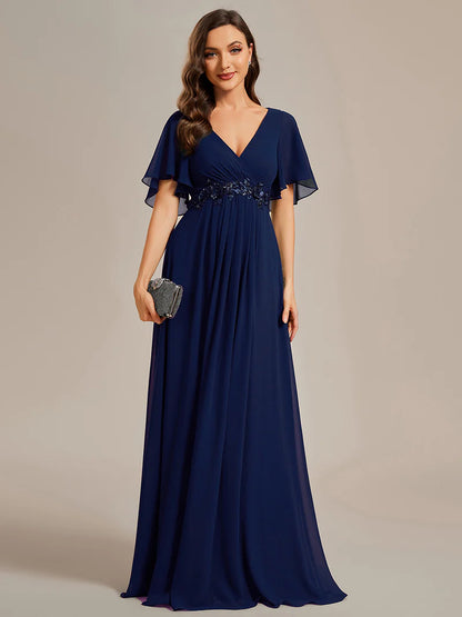 Elegant pleated bridesmaid navy blue dress with V-neckline and floral appliqués